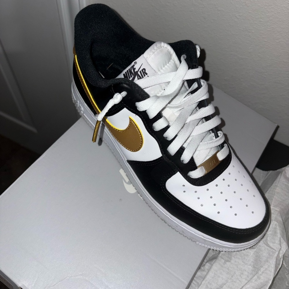 Nike Air Force 1 Black, White, and Gold